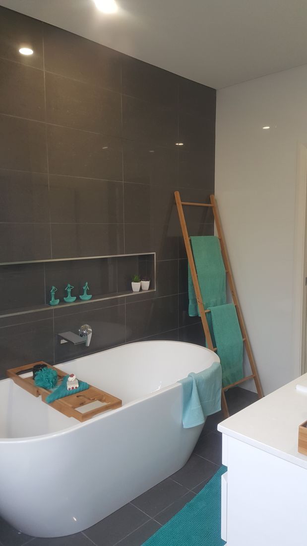 Freestanding tub with grey feature wall — Camden Bathrooms renovation